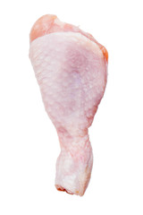 Wall Mural - One Raw chicken leg drumsticks isolated on a white background