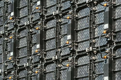 Fotomural Texture of LED panels back view assembled in a large screen-monitor to show the city concert