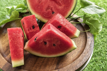 Wall Mural - Fresh sliced watermelon wooden background