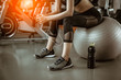 © Take Production - Portrait of Fitness woman  in gym listening to music.exercising concept.fitness and healthy lifestyle