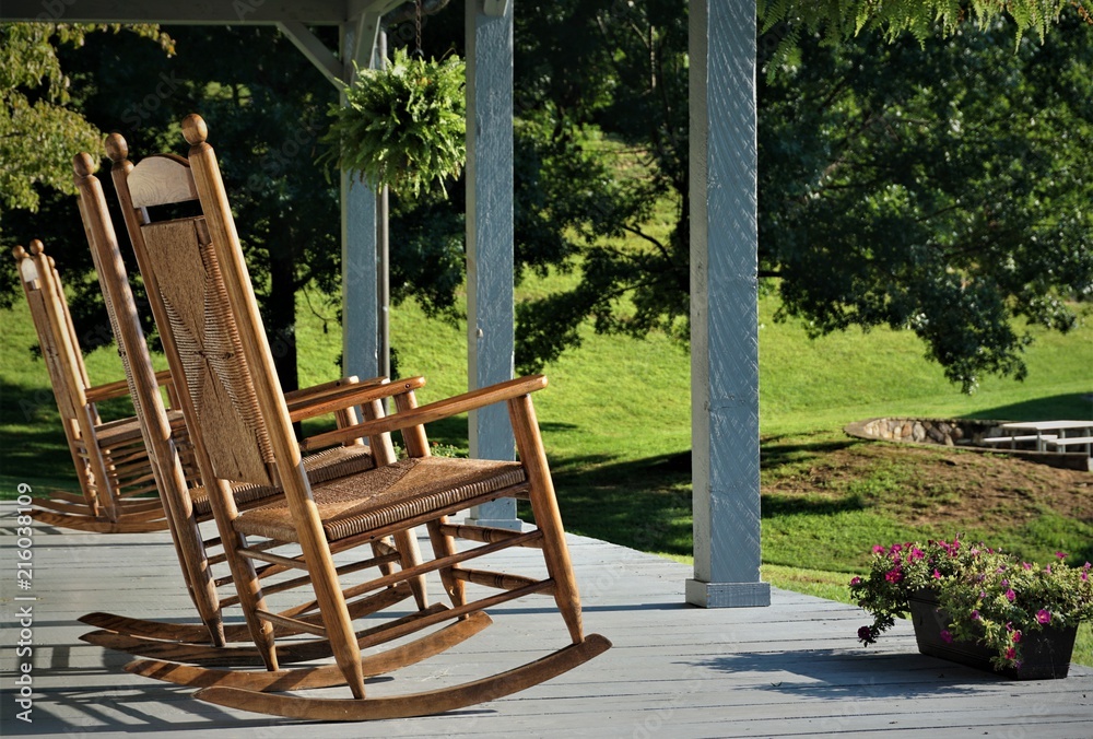The wooden rocking chair at the terrace house with the beautiful view ...