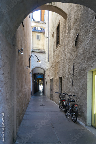 Fotografie, Obraz Street in Bolzano with traditional typical antique houses