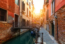 View Of The Street Canal In Venice, Italy. Colorful Facades Of Old Venice Houses. Venice Is A Popular Tourist Destination Of Europe. Venice, Italy.