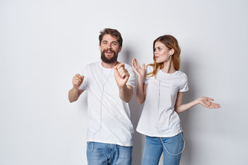 man and woman in white t-shirts