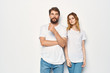 © SHOTPRIME STUDIO - young couple in white t-shirts logo man with a beard woman with flowing hair