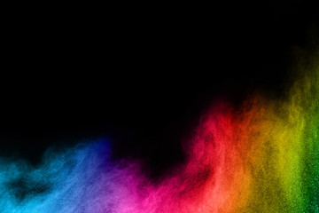 Canvas Print - abstract colored dust explosion on a black background.abstract powder splatted background,freeze mot