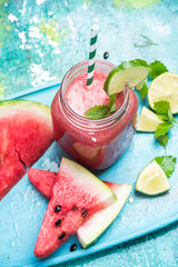 Wall Mural - Fresh watermelon smoothie with lime in jug