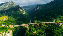 Aerial View Of Durdevica Tara Arc Bridge In The Mountains, One Of The Highest Automobile Bridges In Europe.