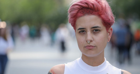 Poster - Young woman in city serious face portrait