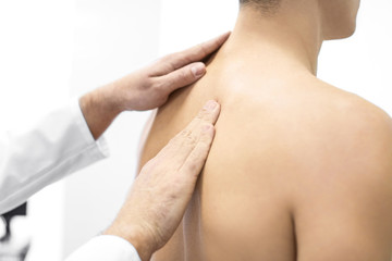 Wall Mural - Orthopedist examining patient in hospital, closeup