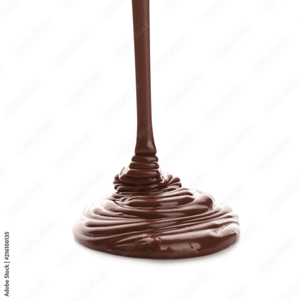 Pouring melted chocolate on white background