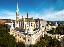 Budapest, Hungary - Aerial View Of Famous Fisherman's Bastion (Halaszbastya) And Matthias Church (Matyas Templom) In The Summer Morning With Buda Hills At Background. Vintage Version