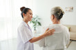 © DragonImages - Nurse talking to patient