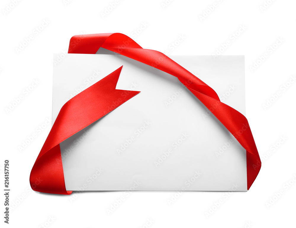 Blank paper card with red ribbon on white background