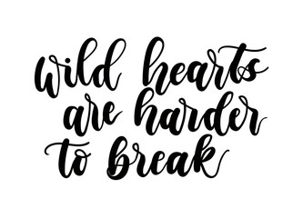 Wall Mural - Wild hearts are harder to break inspirational lettering inscription.  Modern feminism lettering isolated on blue background. Modern design art for poster, greeting card etc