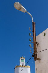 Street lamp and a tower of a mosque