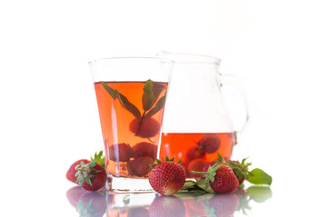 Poster - Sweet compote of ripe red strawberries in a glass decanter