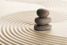 Zen Stones In The Sand. Grey Background