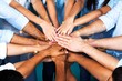 © BillionPhotos.com - Handshake of many young business people teamwork