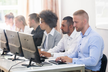 Business Executives Using Computer