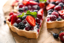 Delicious Pie With Ripe Berries On Table, Closeup