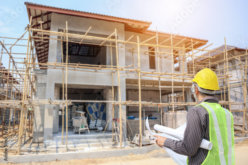 Cuadros en Lienzo Professional engineer architect worker with protective helmet and blueprints pap