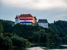 Ozalj Castle With Big Croatian Flag Over Its Front Side To Celebrate Croatia Winning Second Place In World Cup 2018 In Moscow, River Dobra, Karlovac County, Croatia
