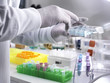 © Westend61 - Biotechnology Research, Scientist viewing specimens in a multi well plate during an experiment in the laboratory