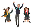 © New Africa - Cute school children in uniform with backpacks jumping on white background