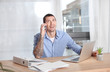 © Africa Studio - Young man in casual clothes talking on cell phone indoors