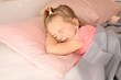 © Africa Studio - Little girl having bad dream while sleeping in bed at home