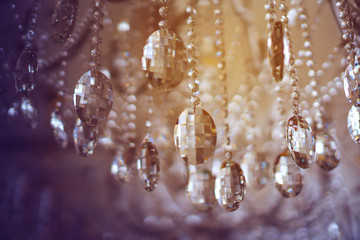 Wall Mural - Crystal chandelier close-up. Glamour background with copy space