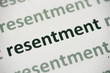 word resentment printed on paper macro