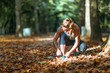 © Microgen - Woman Exercising Outdoors in The Fall