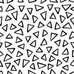 Wall Mural - Abstract seamless black and white pattern of hand drawn doodle triangle elements. Scandinavian design style. Vector illustration for textile, backgrounds etc