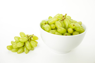 green grape in bowl diet fruit organic on white background