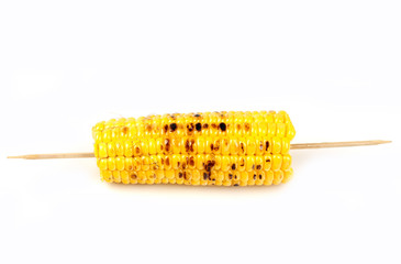 Wall Mural - corn grill on skewers on white background