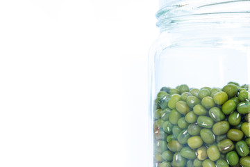 mung bean green in bottle glass on white background