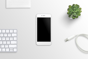 Aufkleber - White smart phone on office desk. Flat lay.