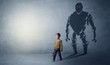 © ra2 studio - Little boy s self image appear as a big robotman shadow on his background