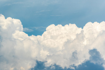 Cloudscape with blue sky and white clouds