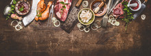 Various Grill An Bbq Meats On Rustic Wooden Background With Aged Kitchen And Butcher Tools, Herbs, Spices, Seasoning And Sauce, Top View, Border