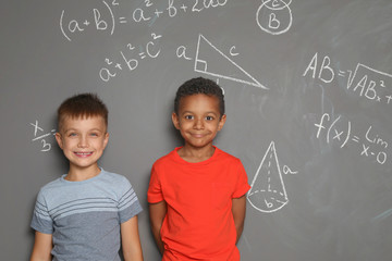 Poster - Little school children and mathematical formulas on grey background