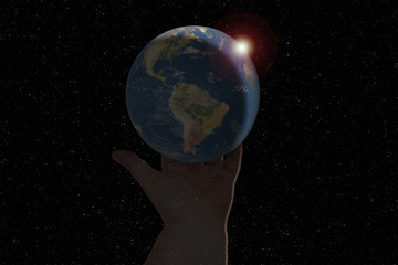 Wall Mural - Hand holding the earth