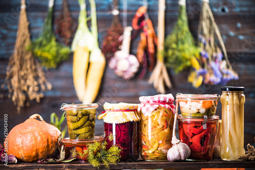 Pickled Marinated Fermented vegetables on shelves Tableau sur Toile