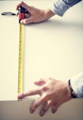 Wall Mural - Man measuring the cabinet