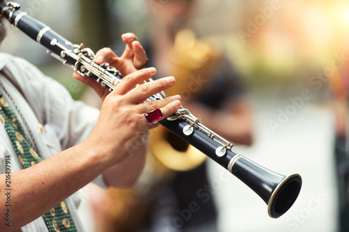 Cuadros en Lienzo Detail of a street musician playing the clarinet