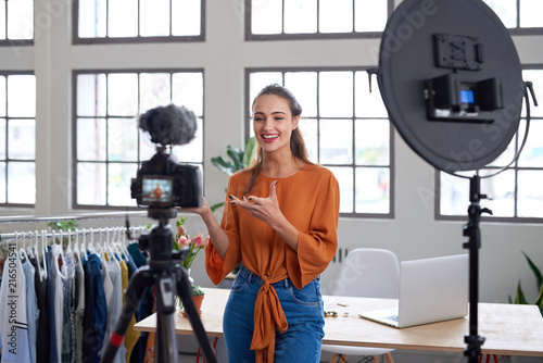 Fotomural Social media entrepreneur recording daily vlog in studio