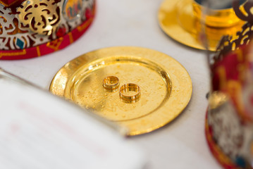 Part of the wedding ceremony in the Church. Church items on the table