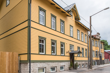 Wall Mural - Tallinn in Estonia, wooden colorful houses, typical facades 
